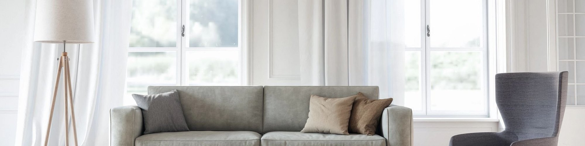 grey couch in living room - Classic Carpets in Midland, TX