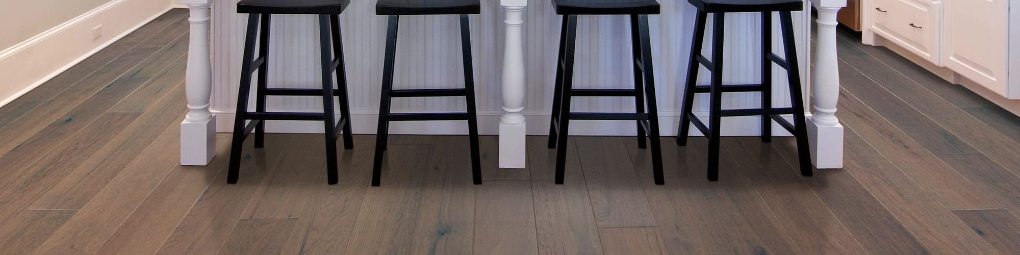 closeup of kitchen island with bar stools - Classic Carpets in Midland, TX