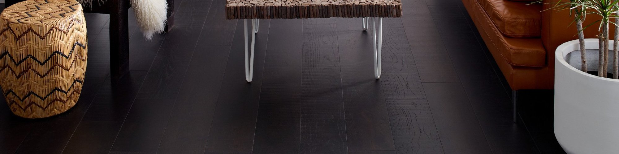 close-up of living room with dark wood floors - Classic Carpets in Midland, TX